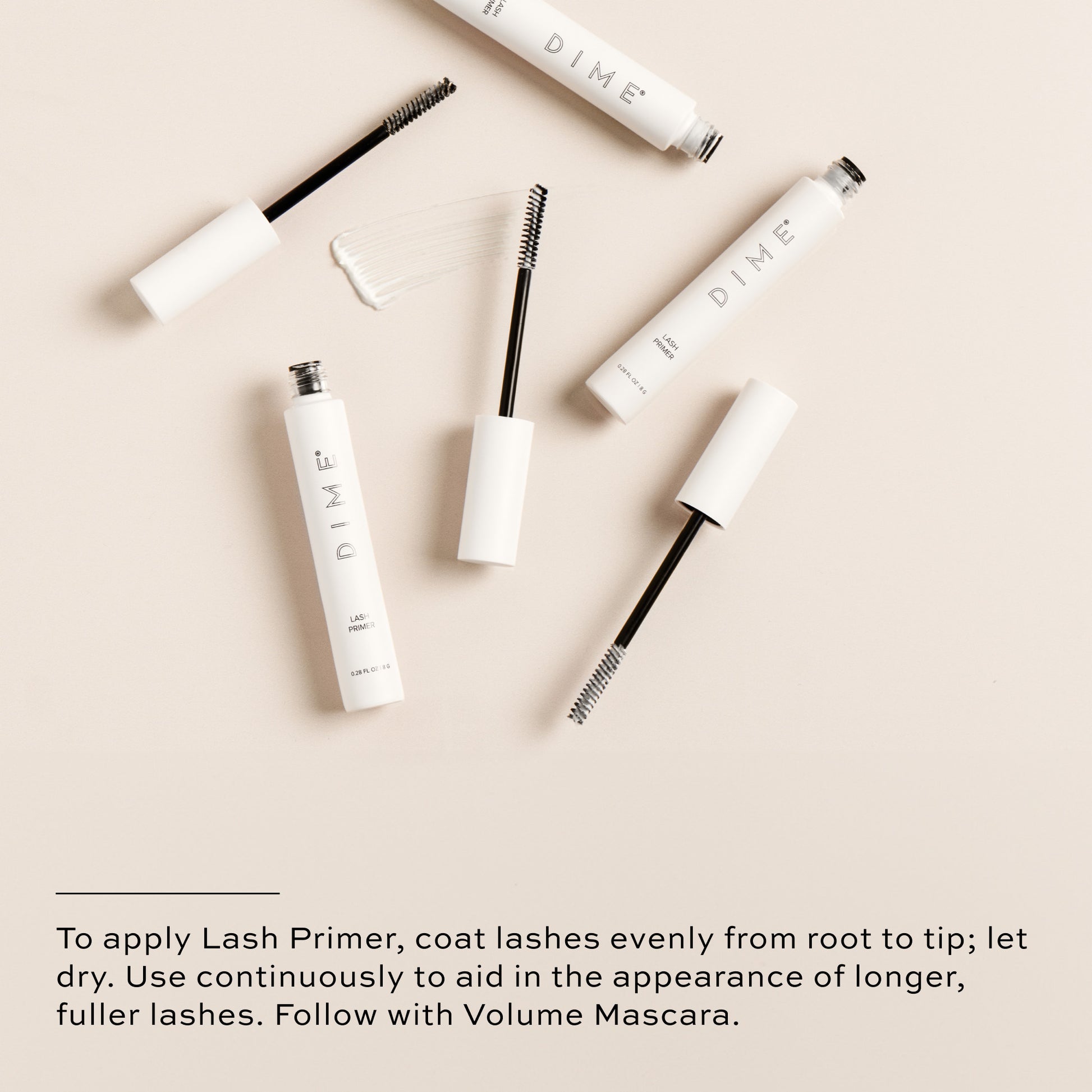 Coat lashes with Lash Primer evenly from root to tip,  follow with volume mascara